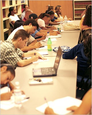 Seminar students and teachers take copious notes during an information session with two ACLU attorneys. Seminar students and teachers take copious notes during an information session with two ACLU attorneys.