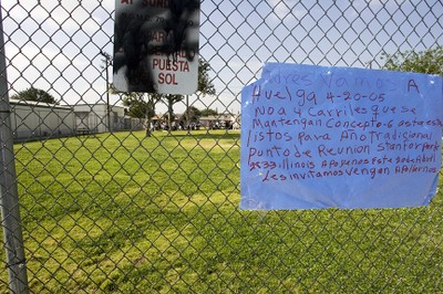 Signs on fence