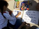 Child making signs