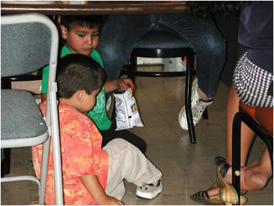 No pre-school or child care is available, so younger children attend the meetings.
