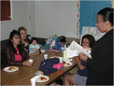 Parents plan next steps after reviewing data about the districts' scores and resources. Parents plan next steps after reviewing data about the districts' scores and resources.