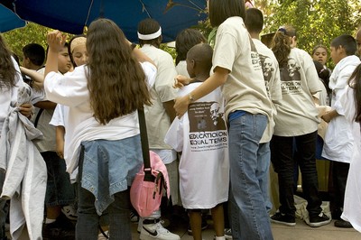 Youth summit students line up for shirts