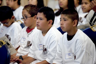 Students listening to the presentations