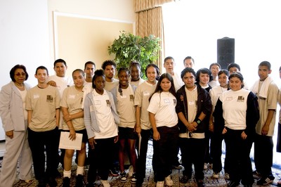 Sylvia Mendez and students pose for a photo